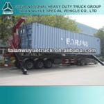 Low price container self loading semi trailer from SINOTRUK-