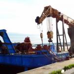 Self loading deck cargo barge with full revolving 126 t crane